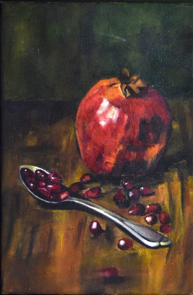 Pintura al óleo de granada roja abierta con semillas sobre una mesa oscura.